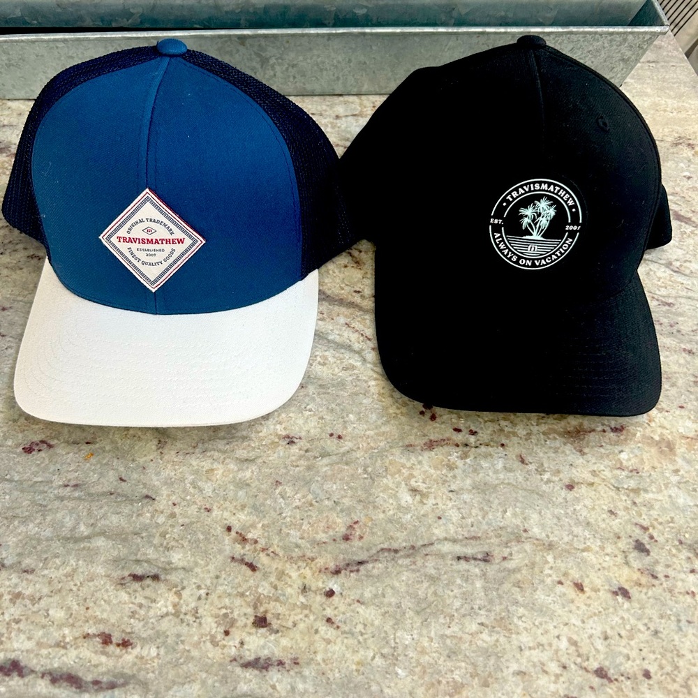 Two Travis Mathew SnapBack hats